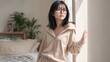 © AiPhoto - 窓辺で外の景色を眺めて物思いにふけるメガネをかけた女性
