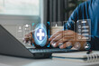 © MUNTHITA - Digital healthcare technology concept. Medical records, online patient data, insurance forms, health management interface on laptop, symbolizing telemedicine, data security, modern medical services.