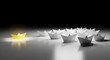 © MD - Shining a Path Illuminated Yellow Paper Boat Leads a Fleet of White Boats Towards Success and Innovation