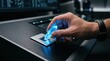 © Creativeraf - Hand inserting a glowing blue crystal data drive into a futuristic console