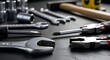 © Meylia - Assorted Hand Tools Collection: Wrenches, Screwdrivers, Pliers, Hammer on Dark Surface