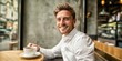 © NovaVision - Smiling man in formal attire enjoys coffee at a modern cafe with blurred background