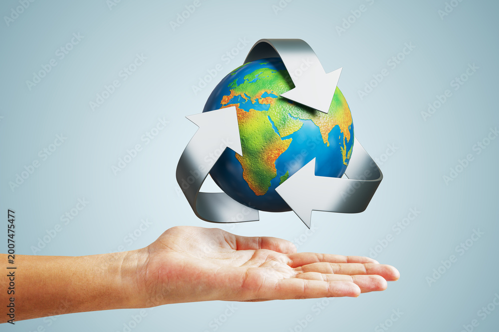 Recycle Human Foto Recycling concept with globe and arrows above human hand on light ...