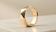 © CatNap Studio - Modern Minimalist Gold: Macro shot of sleek geometric gold ring reflecting soft studio light, elegant luxurious fashion accessory creating calm mood