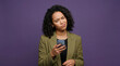 © SemvakCyber - Young woman showing confused reaction while looking at mobile phone
