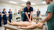 © logonv - Woman student performing cpr on anatomy mannequin with team of medical trainees in classroom. Healthcare simulation training for emergency life support and resuscitation technique.
