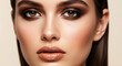 © Cahya - Closeup beauty portrait of a stunning woman with professional smoky eye makeup bronzed skin and glossy lips for highfashion editorial and cosmetic advertising