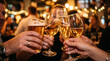 © AFUZbuzz - People toasting with beer and champagne glasses at social gathering.