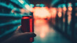 © tashechka - Holding a red can while walking through a grocery store aisle at evening