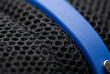 © Viktoria - Macro detail of technical 3D-mesh and cobalt silicone ribbing. High-contrast textures reveal microscopic weave precision and the engineering excellence of professional orthopedic gear.