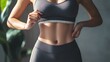 © X - Woman measuring waist with tape health and fitness concept