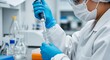 © MstKakoli - Scientist handling liquid in laboratory