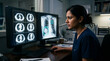 © redtiger9 - Female Healthcare Practitioner Analyzing Diagnostic Imaging in a Clinical Environment