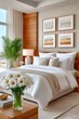 © Georgii - Elegant hotel bedroom with white bed and vase of daisies by a sunlit window