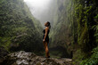 © Westend61 - Hiker exploring Tumpak Sewu Waterfall jungle in Java Indonesia