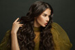© millaf (Nemchinova) - Fashion portrait of woman hair. Beautiful model with long curly hairstyle posing