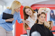 © auremar - supervisor advising trainee hairdresser
