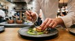 © Coosh448 - Chef delicately plating a seared scallop, fine dining culinary artistry, elegant restaurant presentation, close-up hands, warm kitchen light, realistic detail, no logos