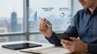 © James - Businessman holding smartphone looking at future holographic charts on revenue trend market share analysis bar graph growth percentage financial data visualization for 2026 YTD Q1