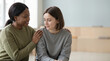 © kodidesign - Psychologist comforting a student during a counseling session. Professional support for academic stress and mental health