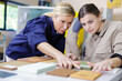 © auremar - concentrated trainee with female mentor