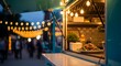 © suraiya - A Delightful Food Truck Offering Fresh Salads and Outdoor Dining Under String Lights at Dusk