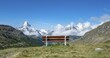 © Mara Brandl/imageBROKER - Bench with view, on snow-covered Matterhorn, 5 lakes hiking trail, Zermatt, Valais, Switzerland