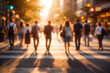 © thodonal - Group of people walking across street during sunset glow