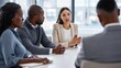 © Mary - Diverse business team in meeting as female leader speaks during a strategy discussion at a conference table
