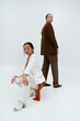 © LIGHTFIELD STUDIOS - Young couple sharing a loving connection in a modern and stylish setting together