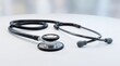 © Khalid - black stethoscope on white table, medical equipment, healthcare