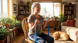 © Anastasiya - Senior woman exercising with resistance band at home seated workout healthy aging strength training mobility practice plus pet companionship cozy wellness routine plus rehabilitation exercise