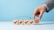 © Macrostock - Goal achievement and business success concept with hand placing wooden block with target icon among check mark blocks on blue background for task management, strategy planning, and project milestone