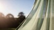 © Andre Jovi - Light Green Sheer Curtain Blowing in the Wind at Sunset