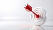 © Hanilita - Abstract 3D rendering of a crimson dart hitting the center of a glossy white bullseye, symbolizing precision in corporate marketing strategy and achieving high-performance business objectives.