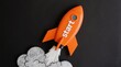 © Viktor - Orange rocket with START text blasting off against dark background. Smoky cloud at base represents ascent. Symbolizes new projects business ventures and big ideas taking flight.