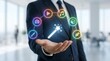© yura - Digital creativity tools for modern professionals. Enhance productivity and innovation. Businessman showcasing icons of technology and creativity.