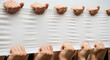 © rozy - Hands holding a blank white banner for advertisement and promotion.