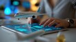 © spyrakot - Logistics designer working on airline fuel dashboard mockup with airplane model and tablet