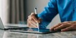 © Jubayer - Procurement process management, Digital and paper document approval, contract verification, supplier negotiation, and business purchasing operations using laptop and approval document