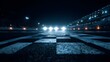© JoaoNalio - Race track starting grid with bright headlights at night under stadium lights