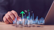 © chaylek - Investment analyst evaluates interest rate growth and financial performance using digital analytics dashboard, profit increase metrics, revenue trends, wealth management strategy, forecasting insights