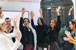 © chokniti - Celebrate and victory to business success with colleagues. Business celebration party event with co-worker partner in business marketing team, winner successful with startup teamwork together