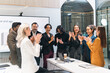 © chokniti - Celebrate and victory to business success with colleagues. Business celebration party event with co-worker partner in business marketing team, winner successful with startup teamwork together