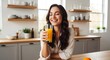© mumtaz - Happy young woman enjoying fresh orange juice in modern kitchen bright morning cheerful healthy lifestyle lifestyle concept