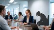 © K4VEE - A smiling businesswoman in a meeting casts a slumped shadow on the wall. Useful for workplace stress, burnout, mental health, and corporate wellness campaigns.