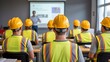 © millennium - Construction workers attending safety training seminar with instructor presentation in classroom