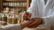 © forenna - Close-up of a traditional Chinese medicine practitioner's hands placing acupuncture needles along a patient's forearm in a contemporary integrative hospital environment, clinical equipment and herba