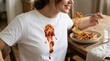 © Alex - Woman eating spaghetti with sauce on her white shirt at home