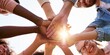 © Khawla - Group of People Raising Hands Together Against Blue Sky, Unity Concept